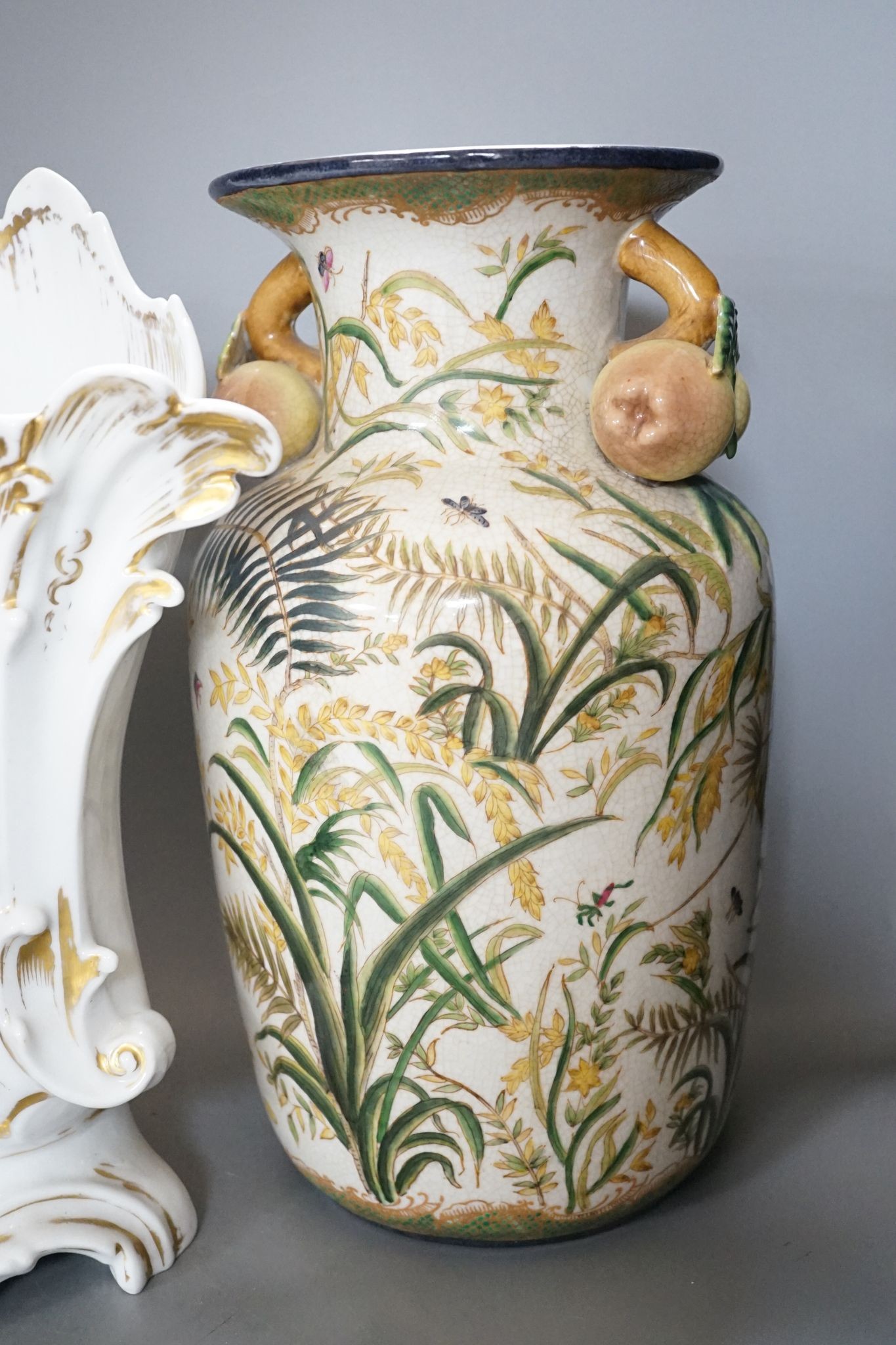 Four pairs of continental porcelain vases including a pair of Wilhelm Schiller & Sons vases